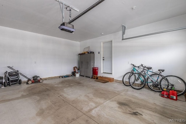 12 Kevwood Ln, Lancaster, NY 14086 - garage featuring a garage door opener