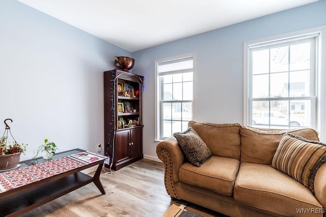 12 Kevwood Ln, Lancaster, NY 14086 - living area featuring baseboards and light wood-style flooring