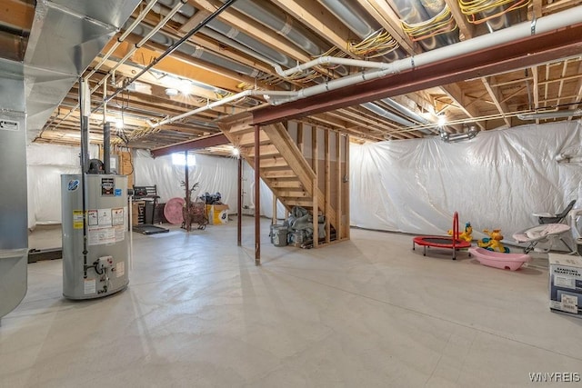 12 Kevwood Ln, Lancaster, NY 14086 - unfinished below grade area with gas water heater and stairs