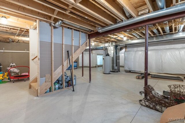 12 Kevwood Ln, Lancaster, NY 14086 - unfinished below grade area with water heater and stairway