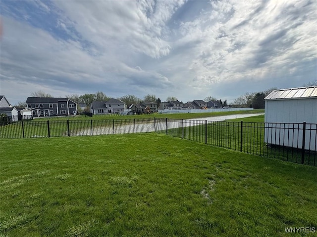 12 Kevwood Ln, Lancaster, NY 14086 - view of yard with a residential view, fence, and a water view