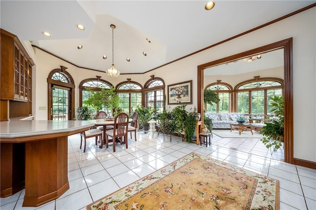 dining room featuring ornamental molding, recessed lighting, light tile patterned flooring, and an inviting chandelier