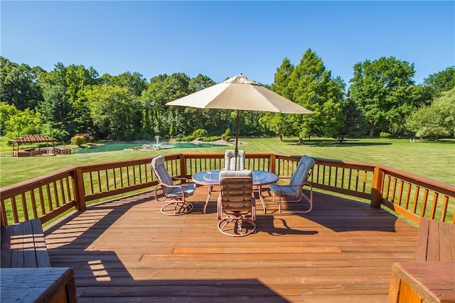 wooden deck with a yard