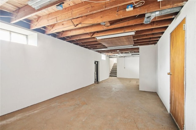 basement featuring stairway