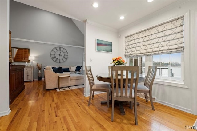 dining room with light wood-style flooring, recessed lighting, visible vents, baseboards, and ornamental molding