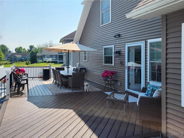 deck featuring outdoor dining space