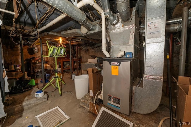 utility room with heating unit