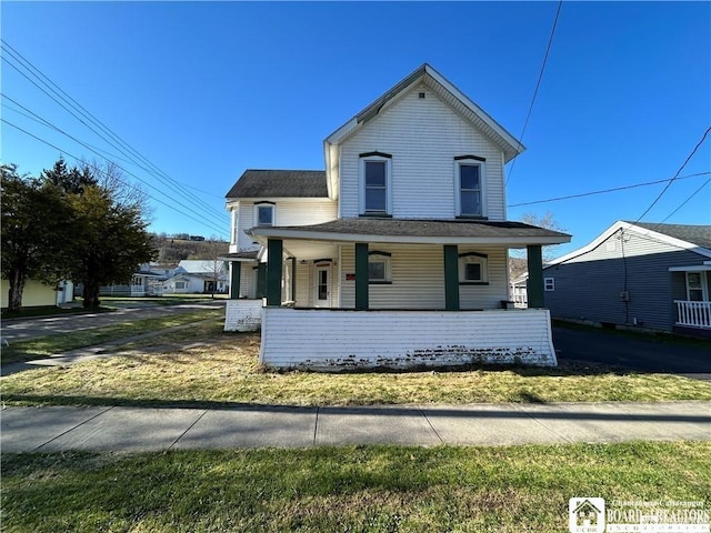 view of front of property featuring covered porch