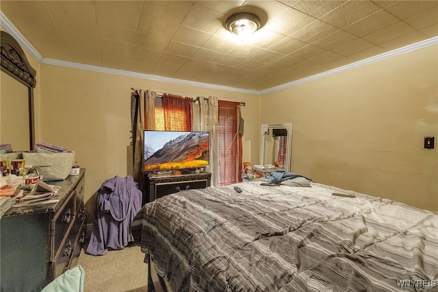 carpeted bedroom featuring ornamental molding