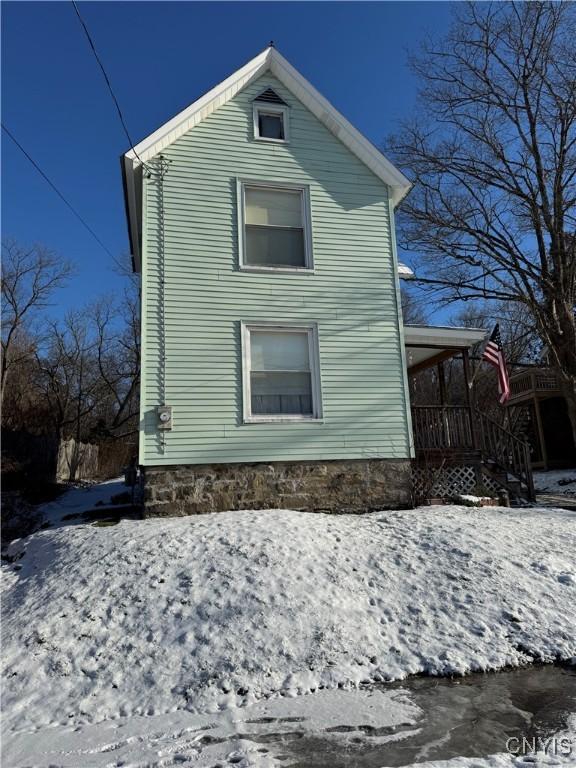 view of snow covered property