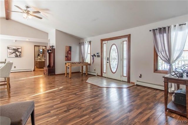 foyer featuring a baseboard heating unit, a baseboard radiator, vaulted ceiling, and wood finished floors