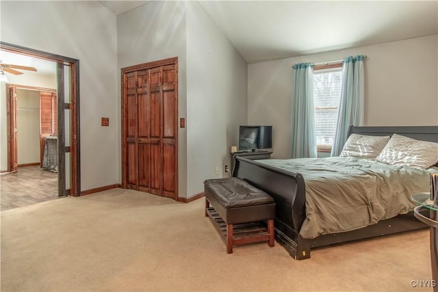 bedroom featuring carpet and baseboards