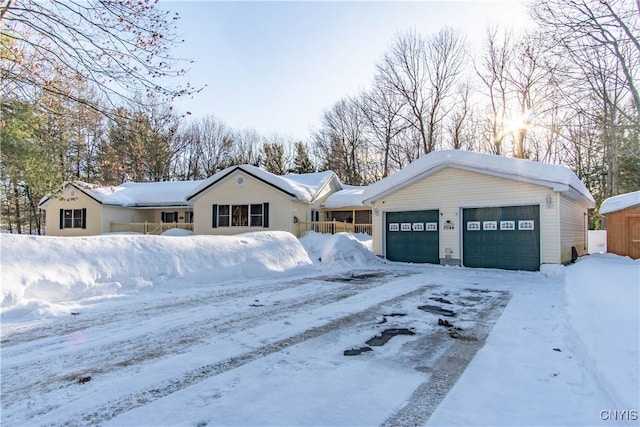 ranch-style house featuring a garage