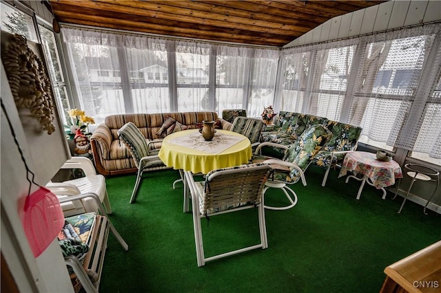 sunroom / solarium with wood ceiling and vaulted ceiling