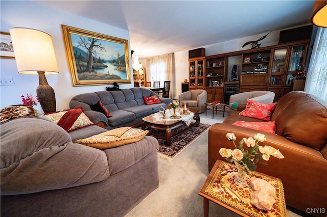 living area featuring carpet and beverage cooler