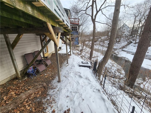 view of yard layered in snow