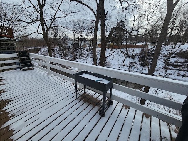 view of snow covered deck