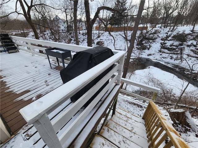 view of snow covered deck