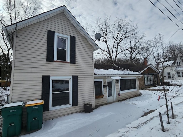 view of snow covered property