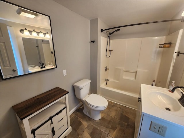 bathroom with bathtub / shower combination, vanity, and toilet