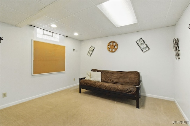 sitting room featuring carpet floors, baseboards, a paneled ceiling, and recessed lighting