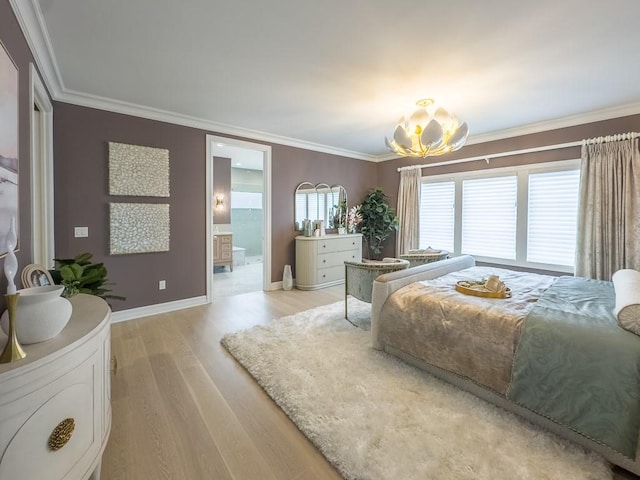 bedroom with ensuite bathroom, ornamental molding, an inviting chandelier, light wood-type flooring, and baseboards