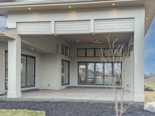 rear view of property featuring a patio area