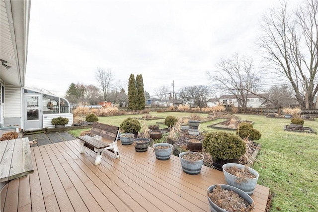 deck featuring a lawn