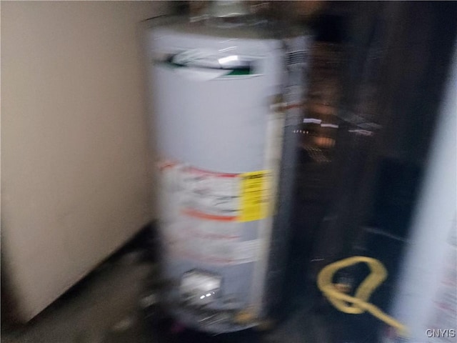 utility room with water heater