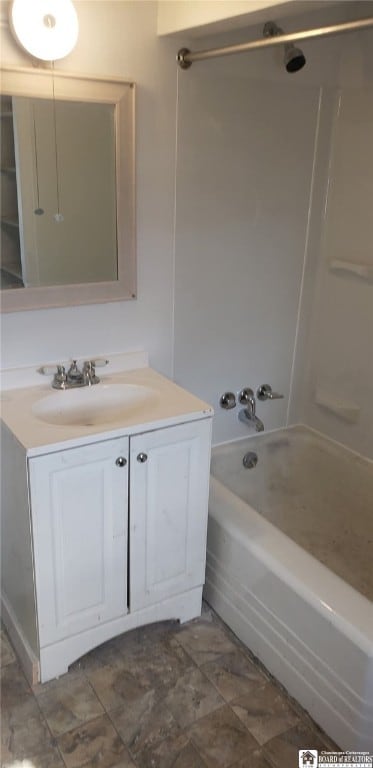 full bath with bathing tub / shower combination and vanity