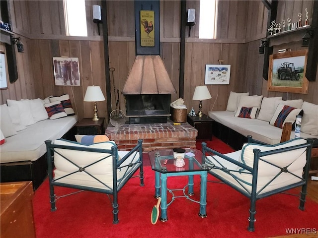 living area featuring wooden walls