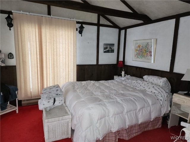 bedroom featuring lofted ceiling with beams and carpet floors