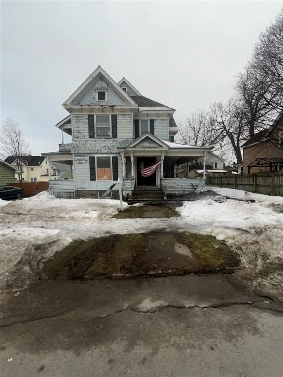 view of front of house with fence