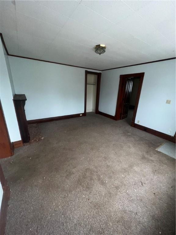 empty room with baseboards