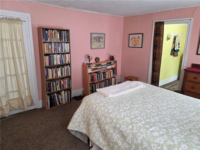 carpeted bedroom with baseboards