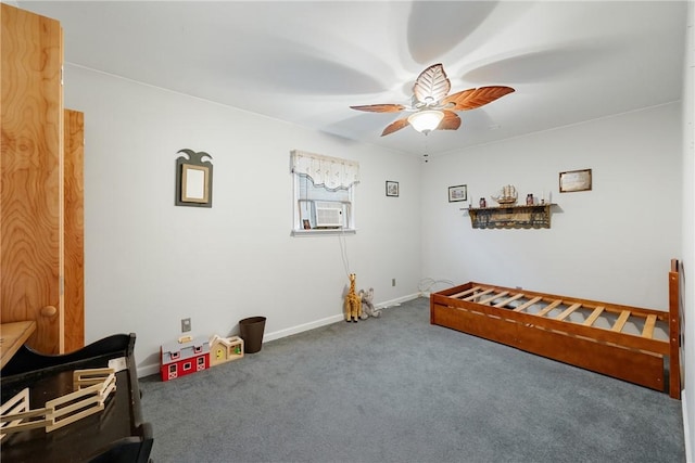 game room featuring ceiling fan, carpet floors, cooling unit, and baseboards