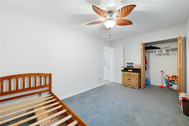 bedroom with a closet, light carpet, ceiling fan, and baseboards