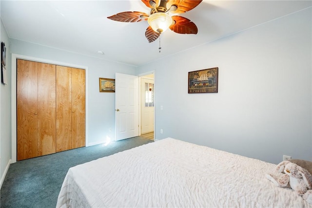 carpeted bedroom with a closet and ceiling fan