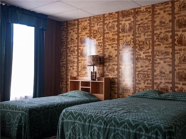 bedroom with a paneled ceiling