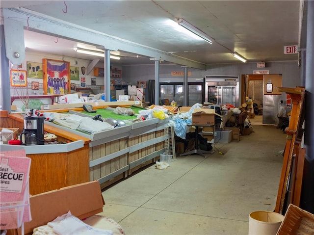 miscellaneous room with concrete flooring