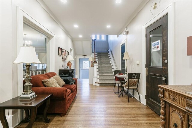 2956 Saint Paul Blvd, Irondequoit, NY 14617 - living room featuring recessed lighting, stairway, and wood finished floors
