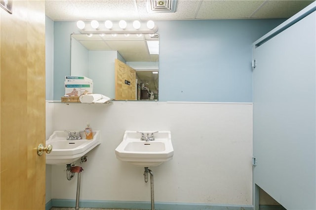 2956 Saint Paul Blvd, Irondequoit, NY 14617 - bathroom featuring a drop ceiling, a sink, and visible vents