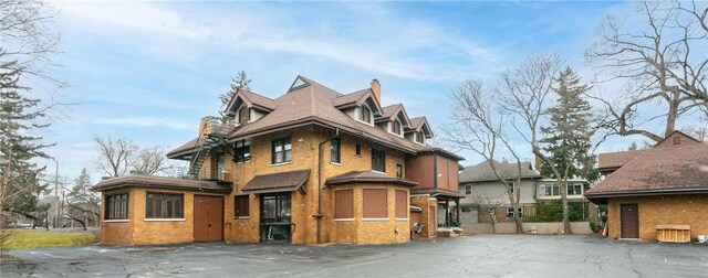 2956 Saint Paul Blvd, Irondequoit, NY 14617 - view of front of home with a chimney