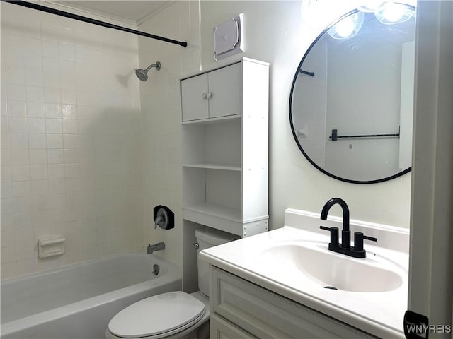 bathroom featuring toilet, tub / shower combination, and vanity