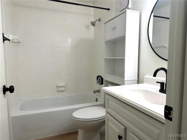 full bath with toilet, vanity, and shower / bathing tub combination