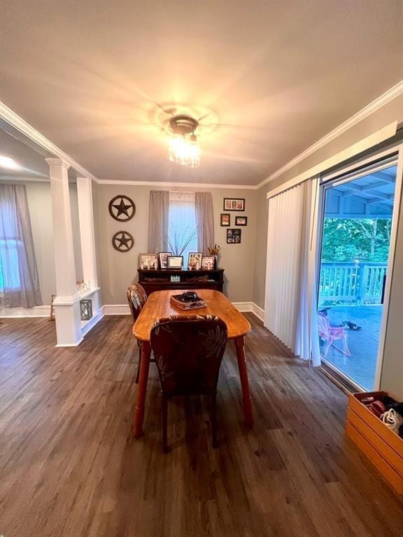 dining area with dark wood-style floors, ornamental molding, decorative columns, and baseboards