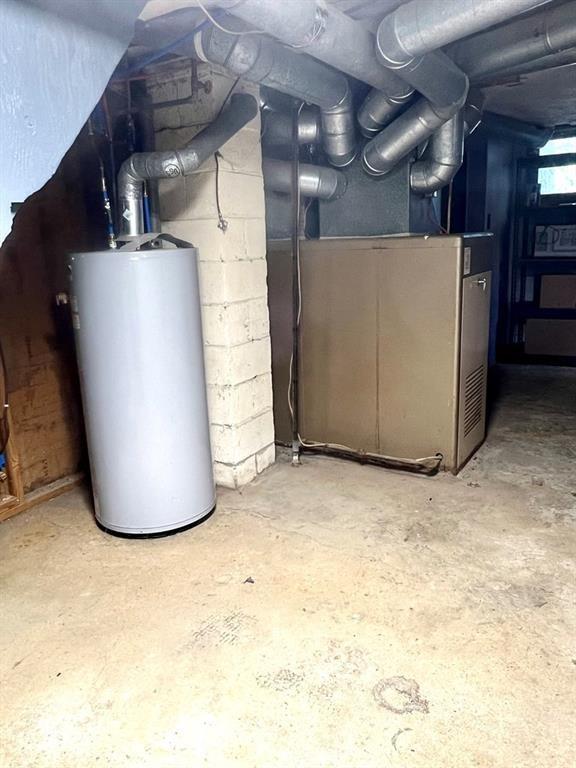 utilities with gas water heater and heating unit