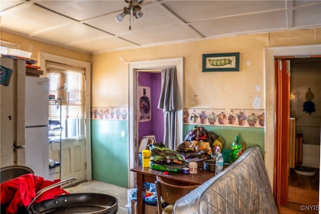 kitchen with freestanding refrigerator