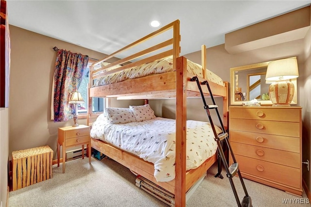 bedroom featuring carpet floors, recessed lighting, and baseboard heating