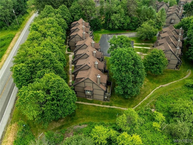 birds eye view of property with a residential view